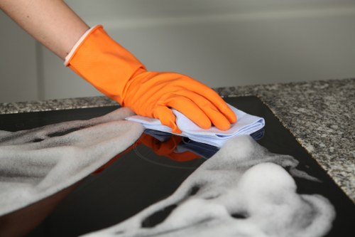 Cleaning technician preparing equipment safely before a carpet cleaning job
